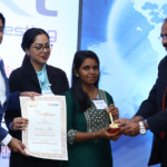 Janani Priya collecting her award for Graduate Tester of the Year 2022